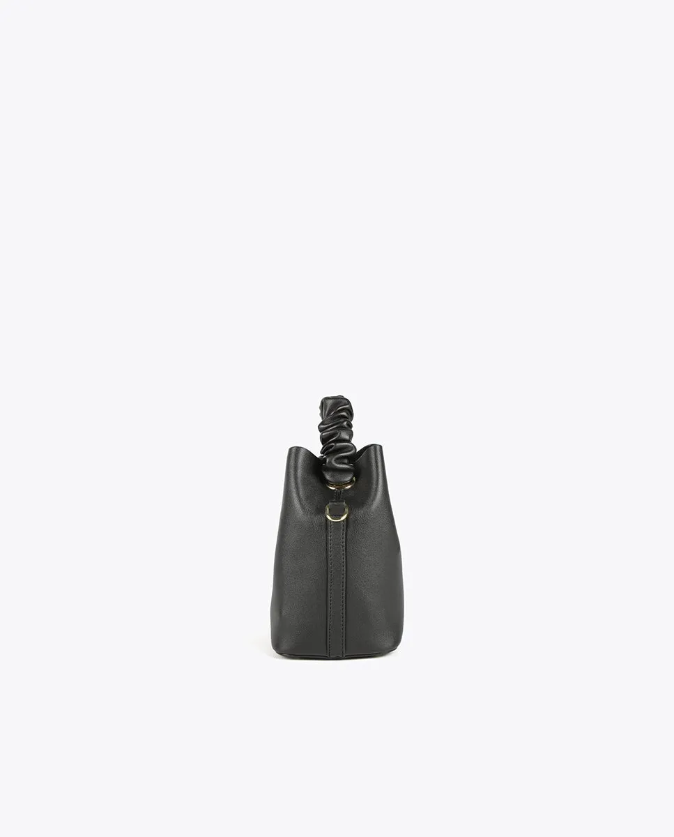 Crossbody bag with gathered strap