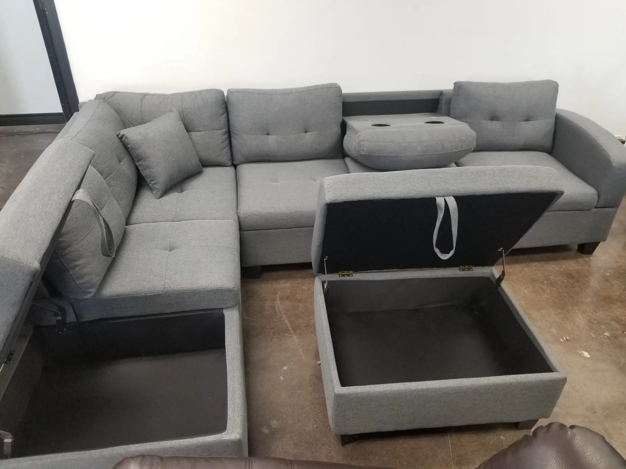 Grey Fabric Sectional With Drop Down Cup Holder & Throw Pillows- Extra Storage- Model #1982