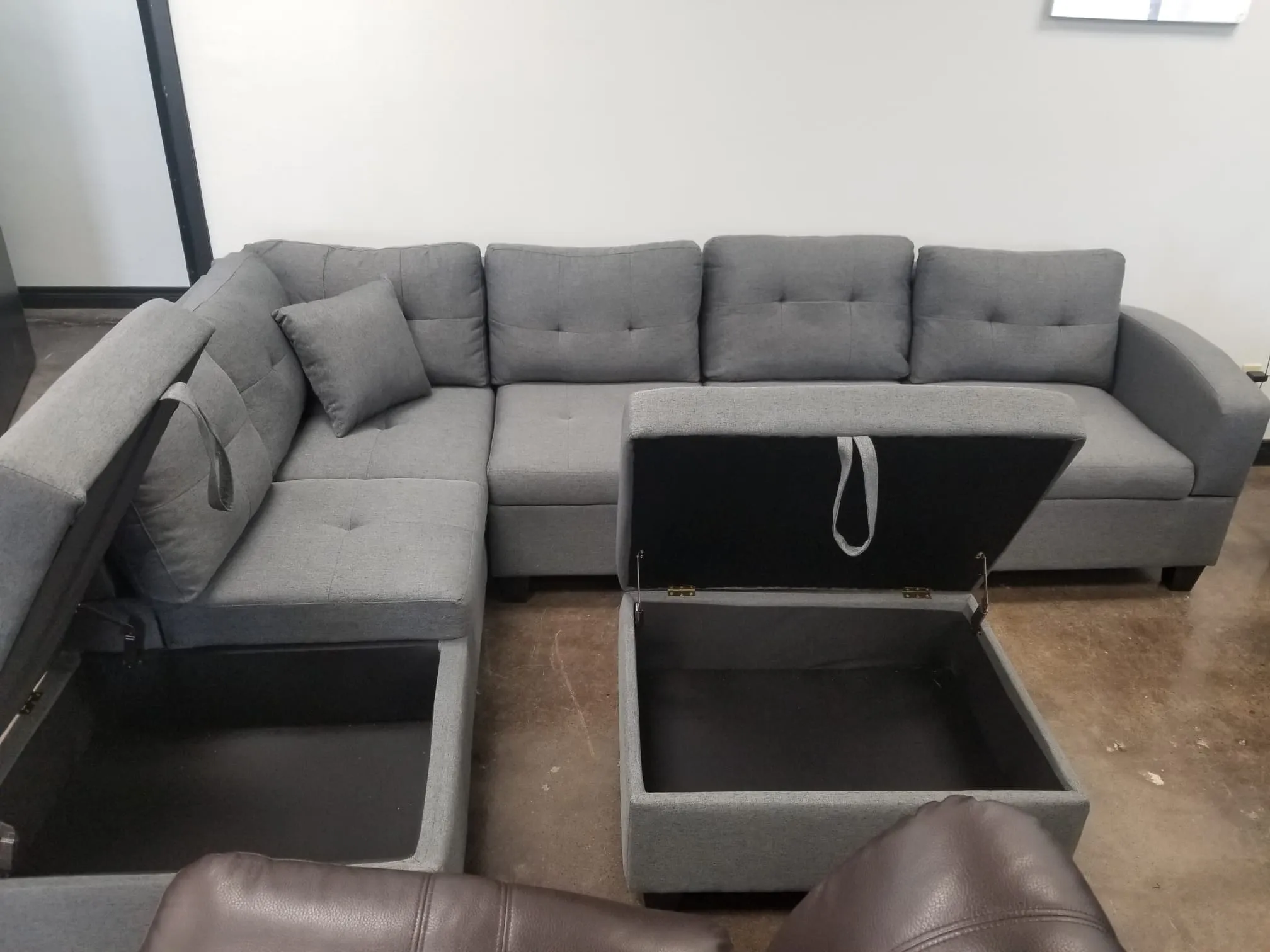 Grey Fabric Sectional With Drop Down Cup Holder & Throw Pillows- Extra Storage- Model #1982