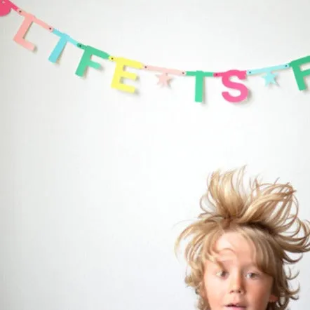 OMM Design Multi-coloured Word Banner