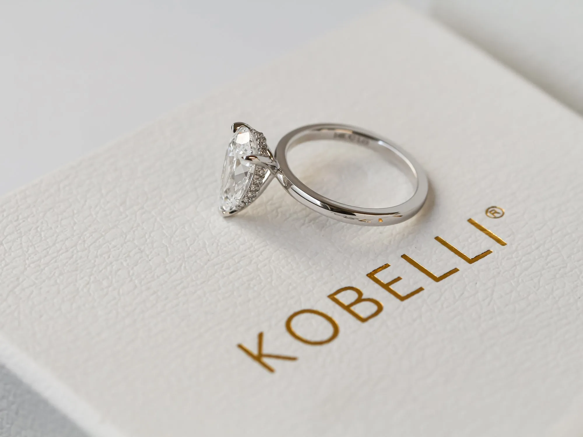 Pear Hidden Halo Ring