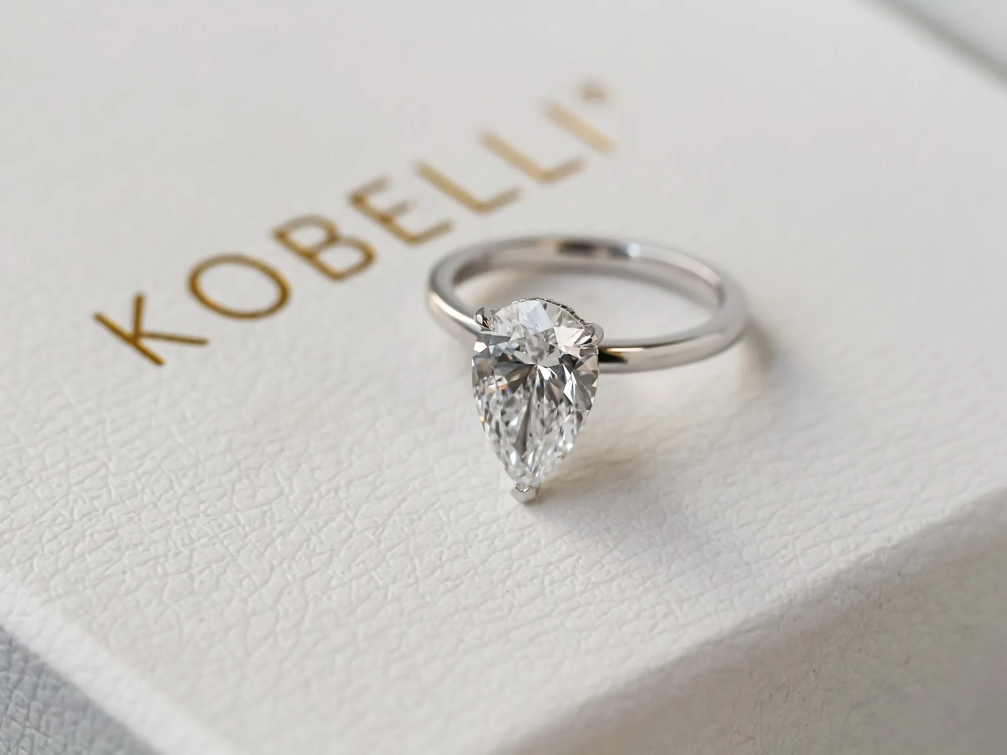 Pear Hidden Halo Ring