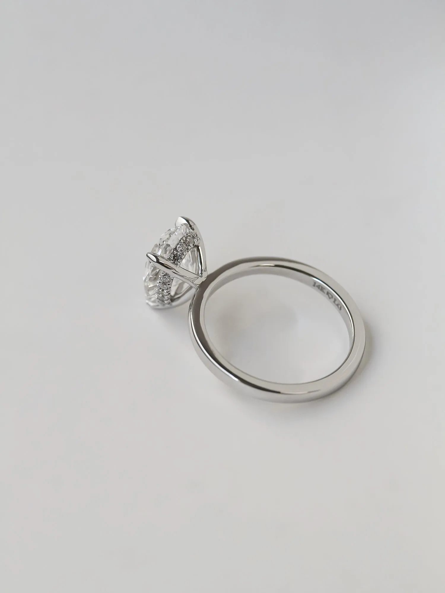 Pear Hidden Halo Ring