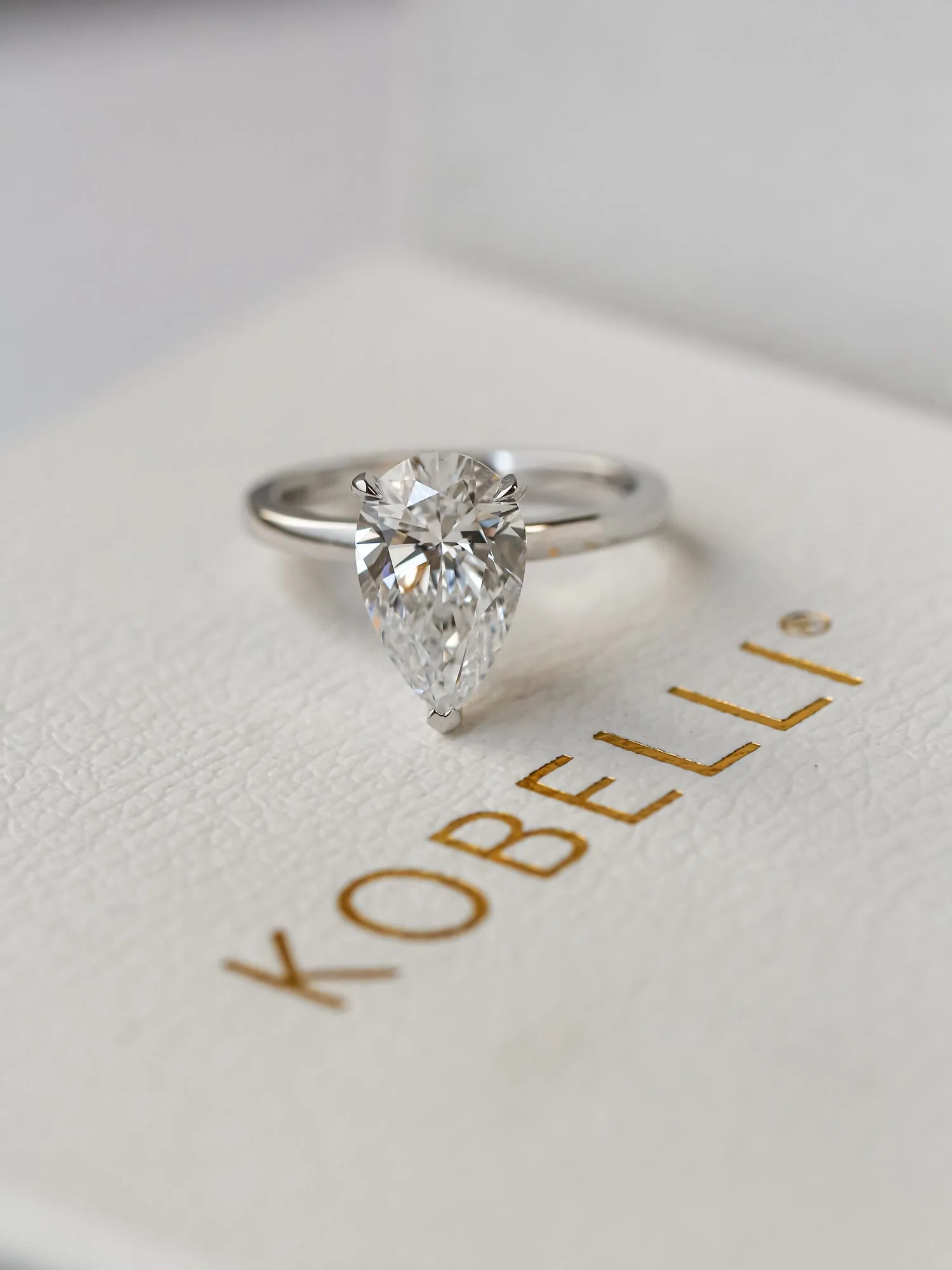 Pear Hidden Halo Ring