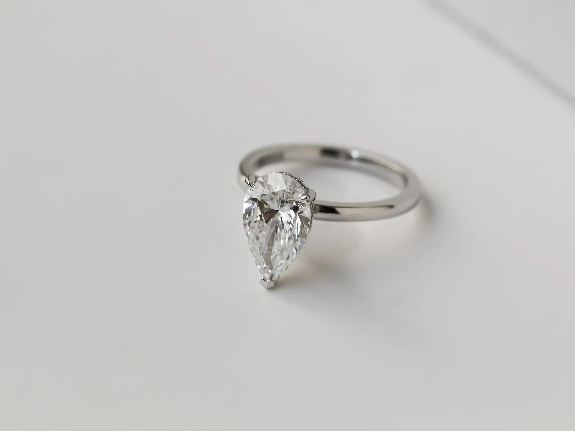 Pear Hidden Halo Ring