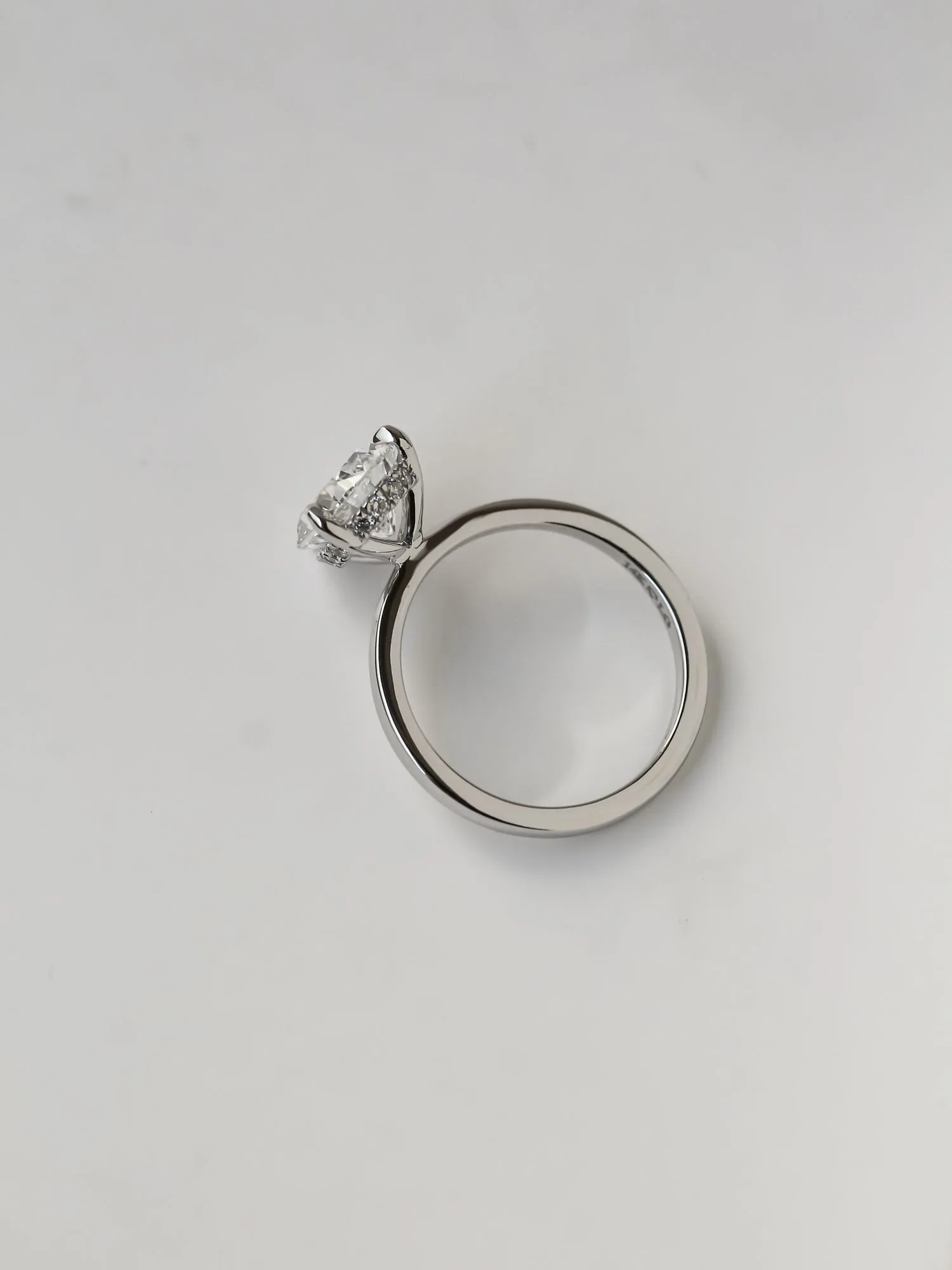 Pear Hidden Halo Ring