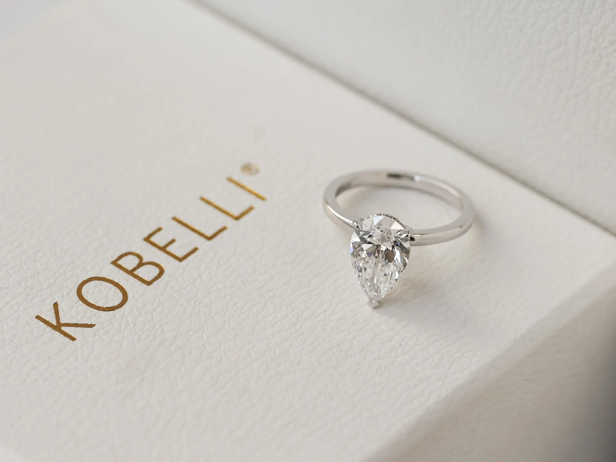Pear Hidden Halo Ring
