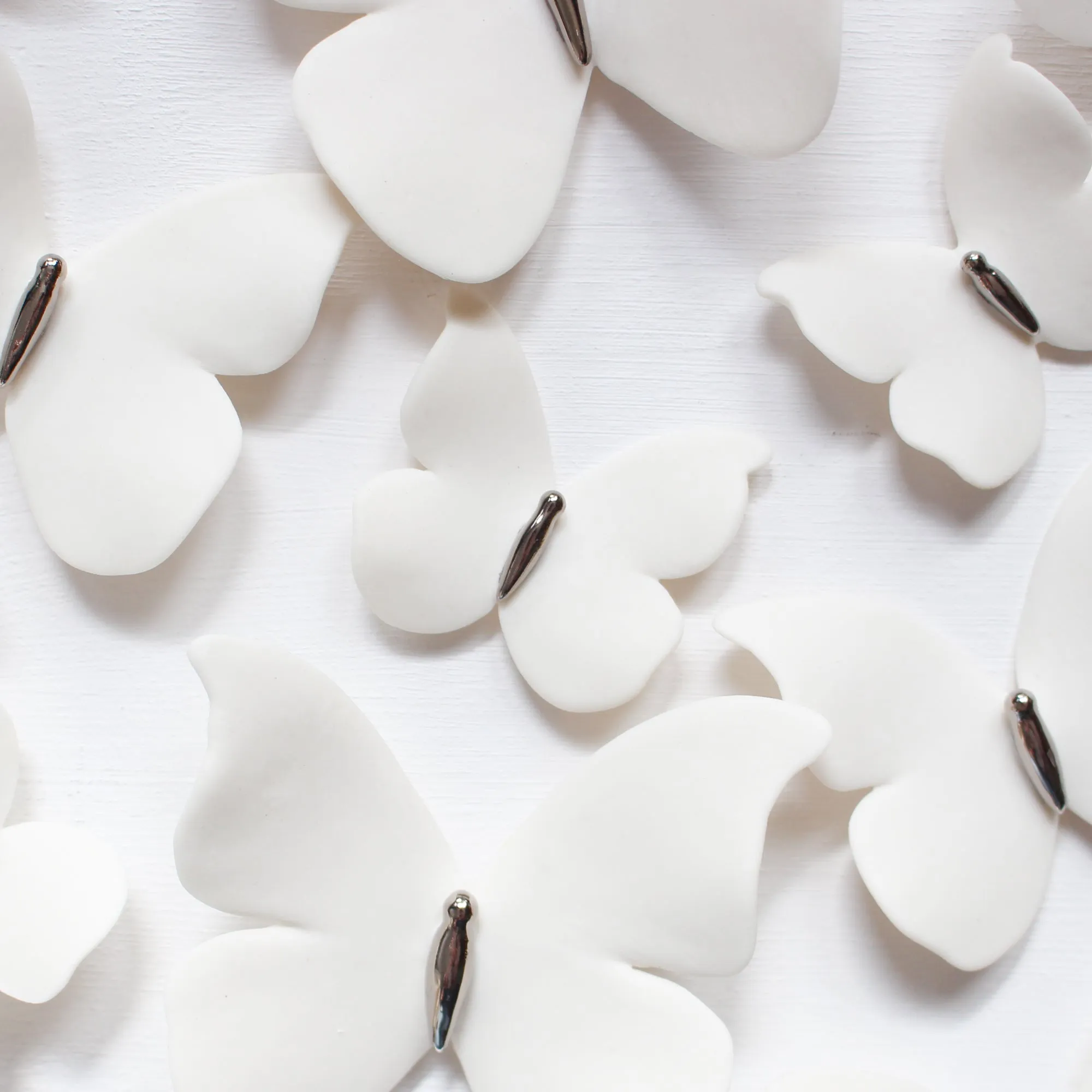 Platinum Butterflies