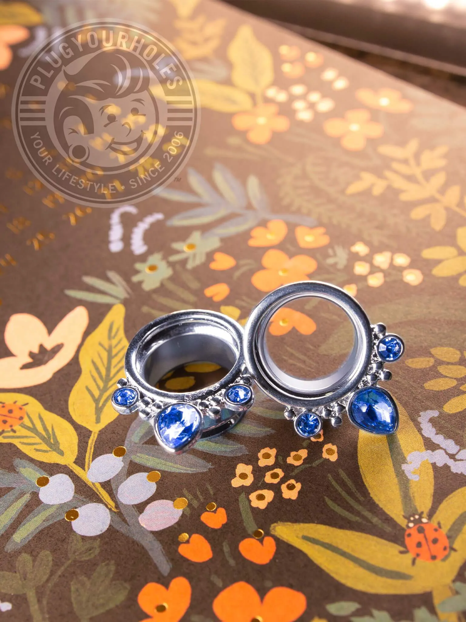 Triple Prong Blue Sapphire Double Flared Steel Tunnels